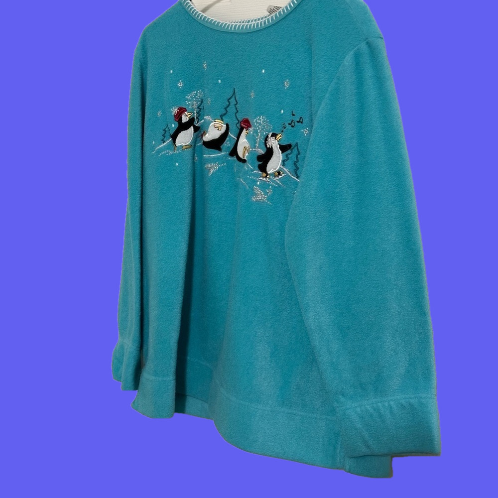 Ladiesfleece pullover with glittery penguins on front/back. Size 18W/20W.